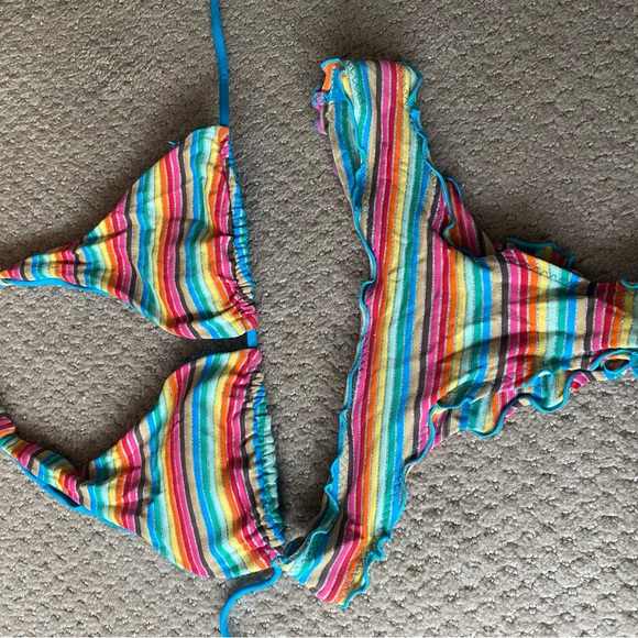 Size small vitamin A swimsuit. Top is reversible to a royal blue. - Picture 3 of 3